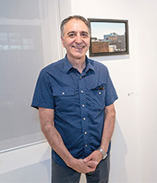 ASL Artist with cityscape painting Thumbnail